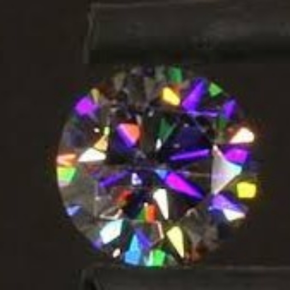 Strontium Titanate is a Man Made Gemstone with brighter Refractive Properties - Picture 5 of 7